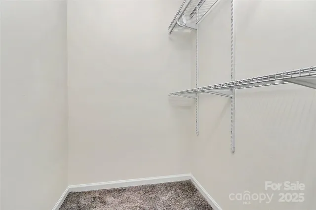 a view of small space with racks on the wall