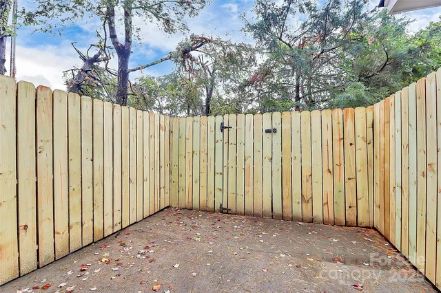 a view of a wooden fence