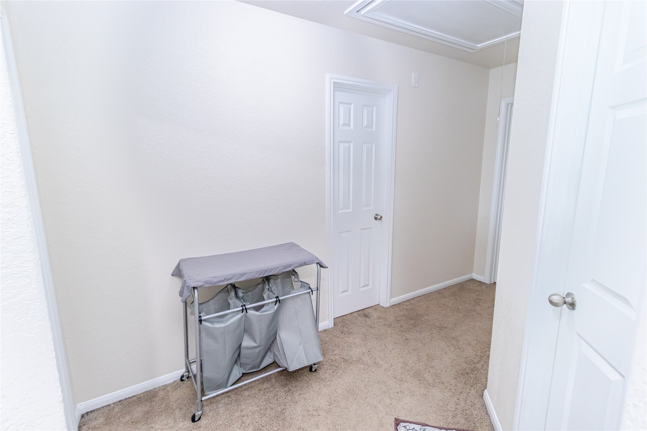 8222 Pastel Dawn Trace Houston, TX 77049 - Photo 15 of 35 a room with storage and utility