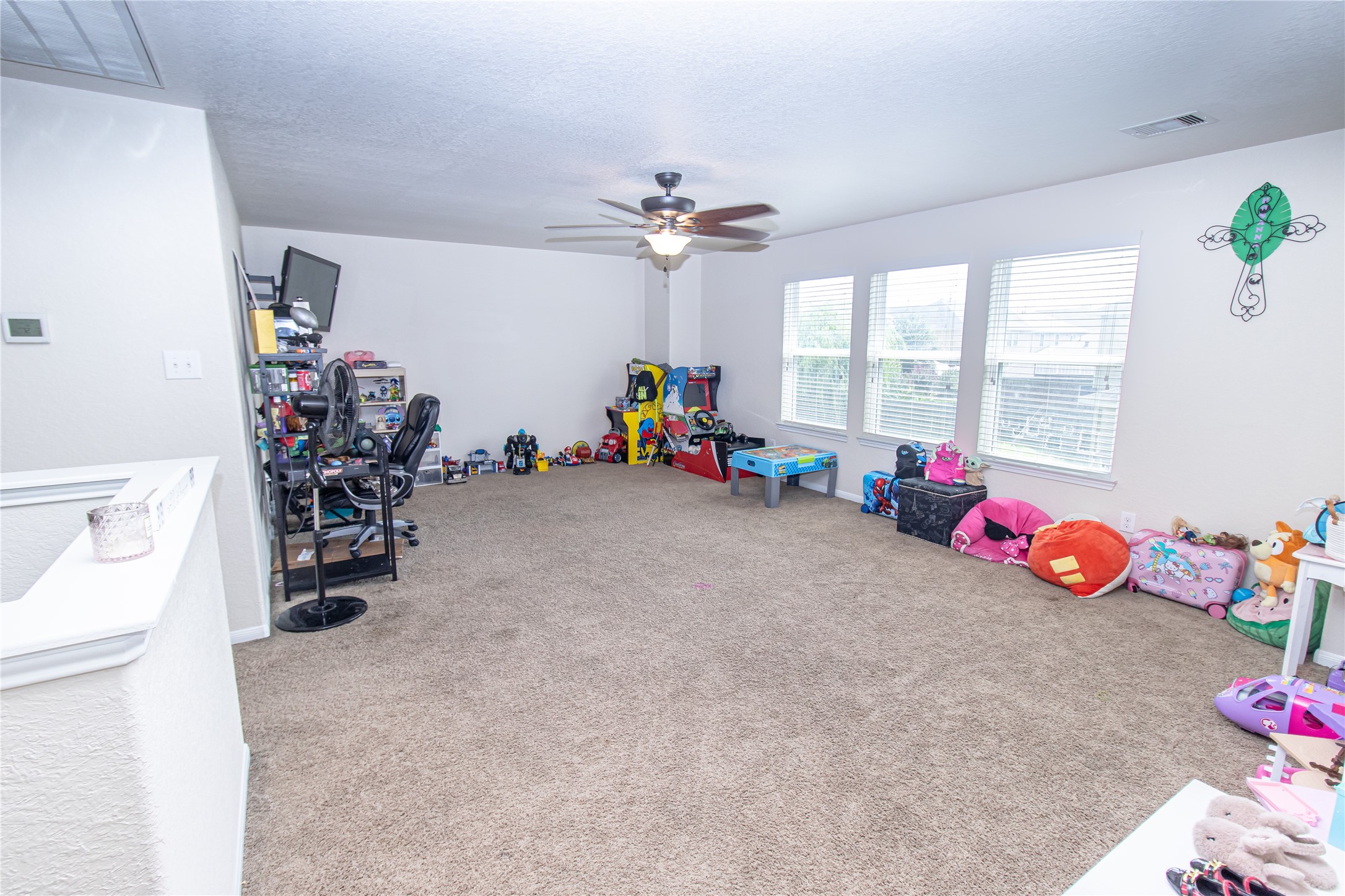 8222 Pastel Dawn Trace Houston, TX 77049 - Photo 17 of 35 a view of a room with toys and toys