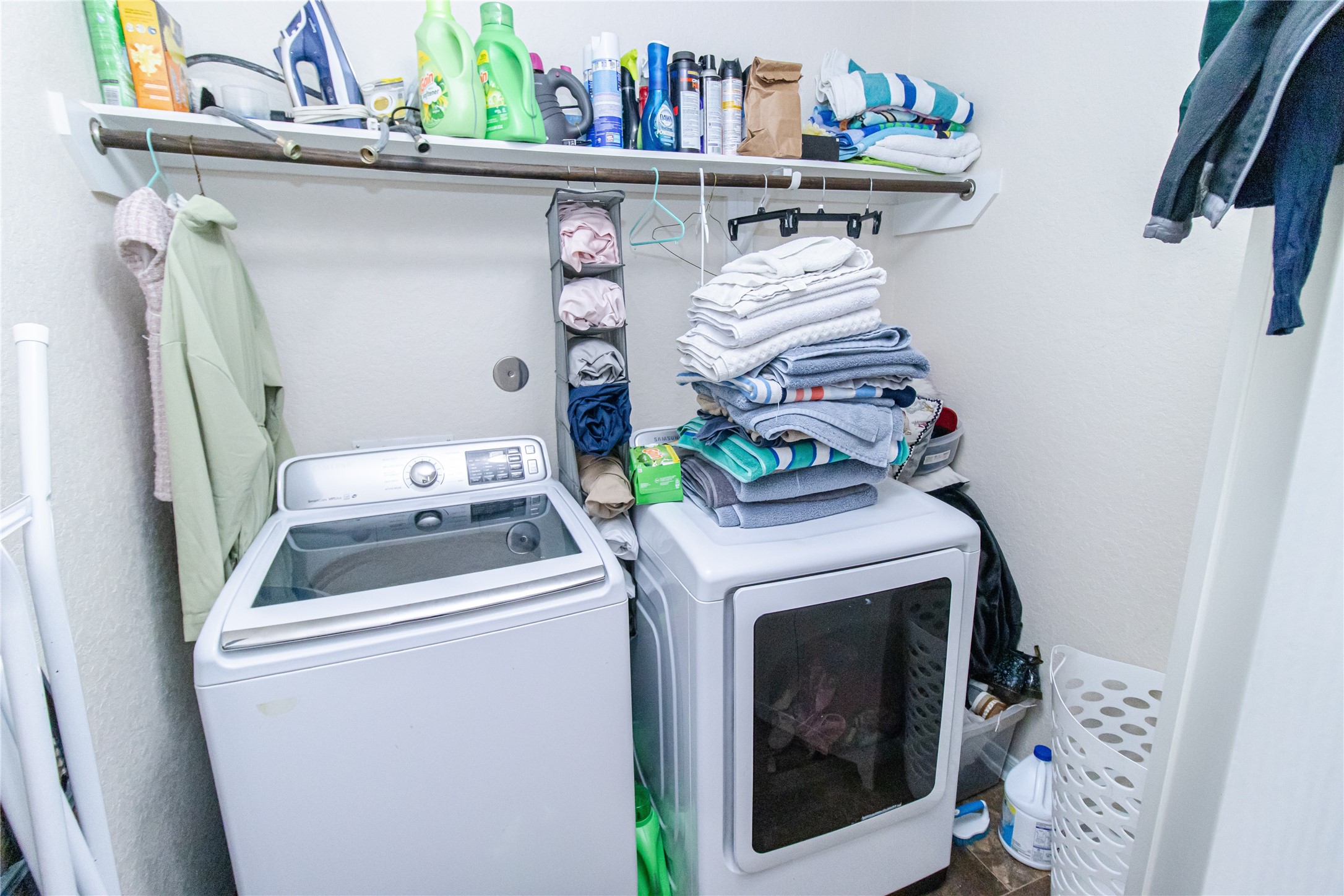 8222 Pastel Dawn Trace Houston, TX 77049 - Photo 32 of 35 a utility room with dryer and washer