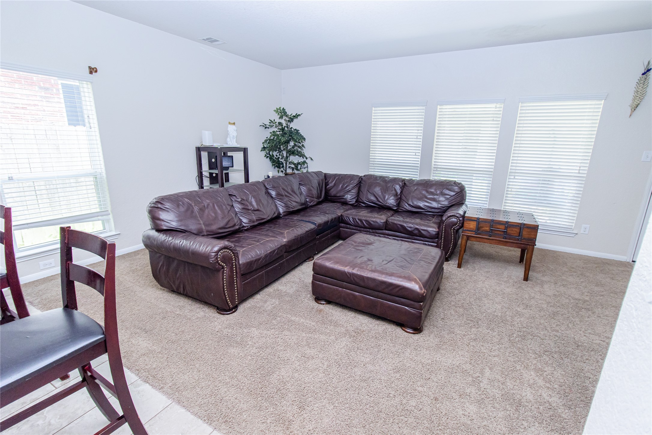 8222 Pastel Dawn Trace Houston, TX 77049 - Photo 5 of 35 a living room with furniture and a window