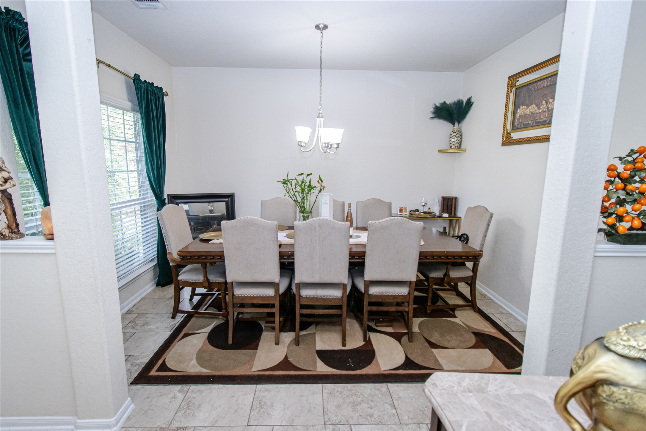 8222 Pastel Dawn Trace Houston, TX 77049 - Photo 8 of 35 a view of a dining room with furniture and wooden floor