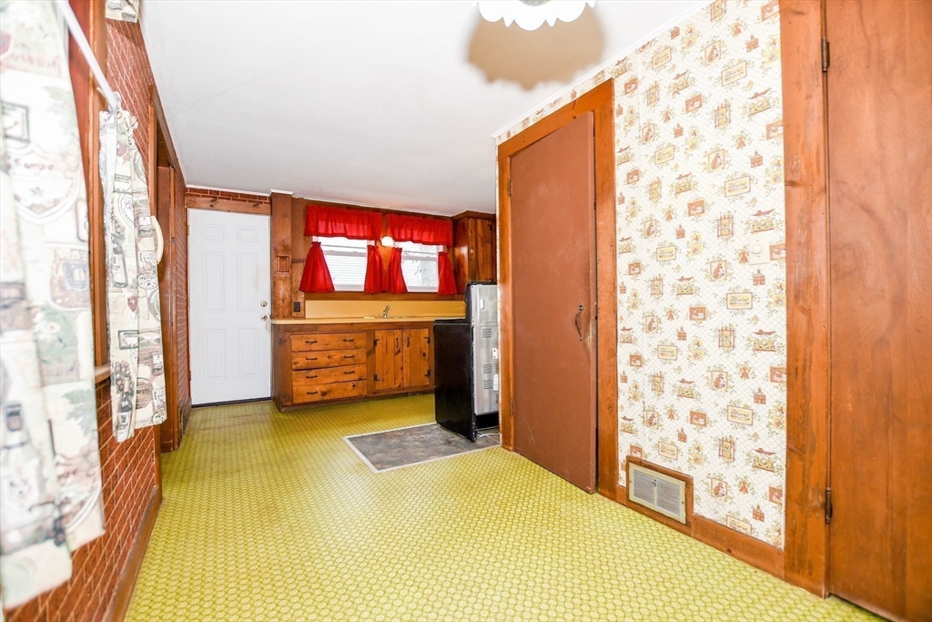 10 Converse Road Marion, MA 02738 - Photo 15 of 33 a bedroom with a bed and a window