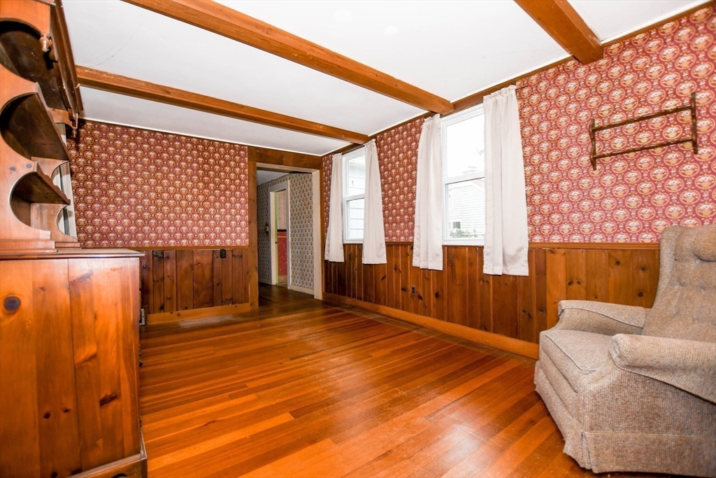 10 Converse Road Marion, MA 02738 - Photo 20 of 33 a view of an empty room with wooden floor and a window
