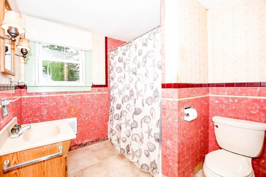 10 Converse Road Marion, MA 02738 - Photo 27 of 33 a bathroom with a sink toilet and shower