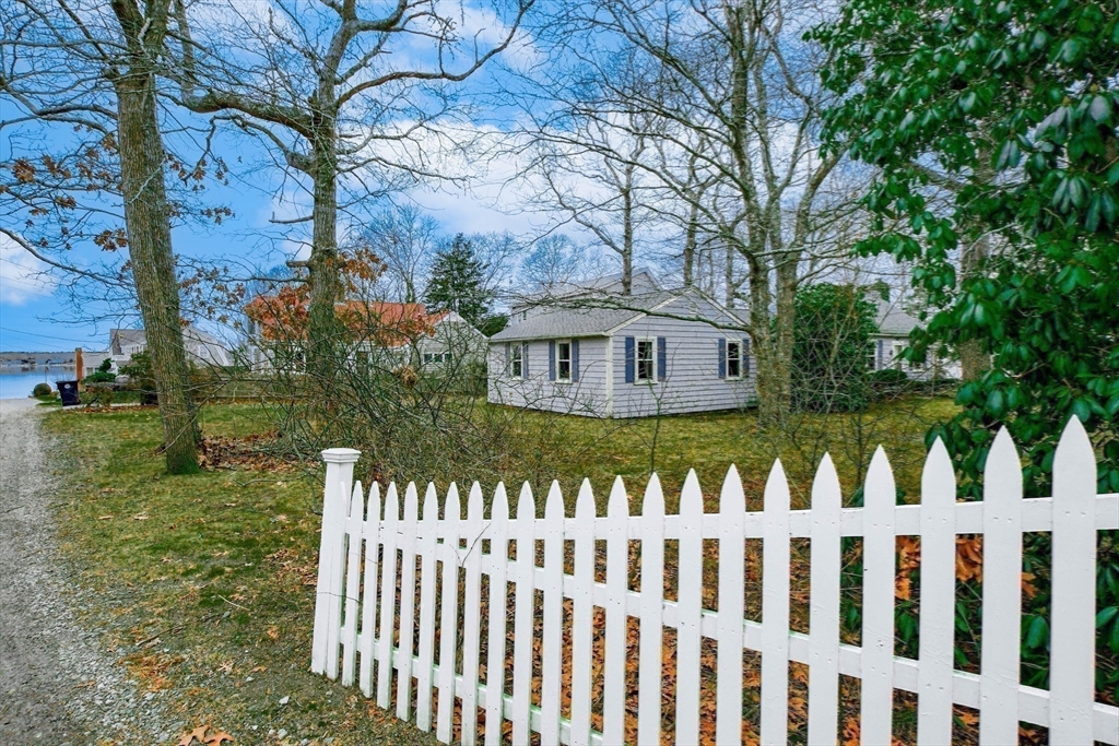 10 Converse Road Marion, MA 02738 - Photo 33 of 33 a front view of a house with a garden
