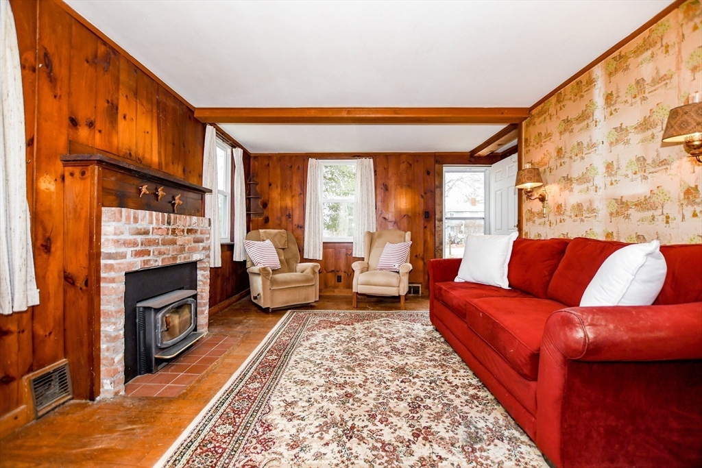 10 Converse Road Marion, MA 02738 - Photo 7 of 33 a living room with furniture fireplace and a flat screen tv