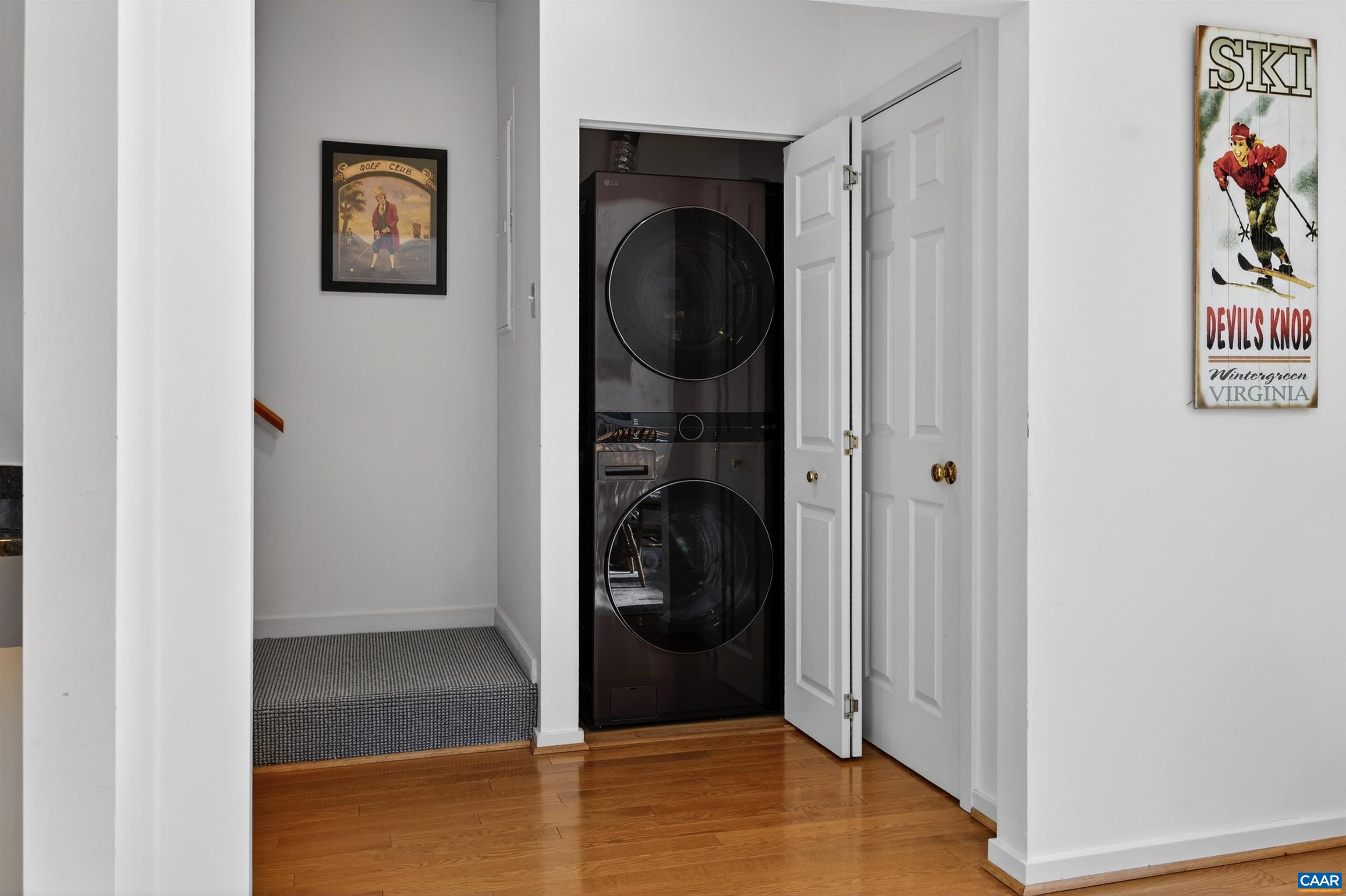 22 Trillium Cl Roseland, VA 22967 - Photo 17 of 35 a view of a hallway with wooden floor and closet