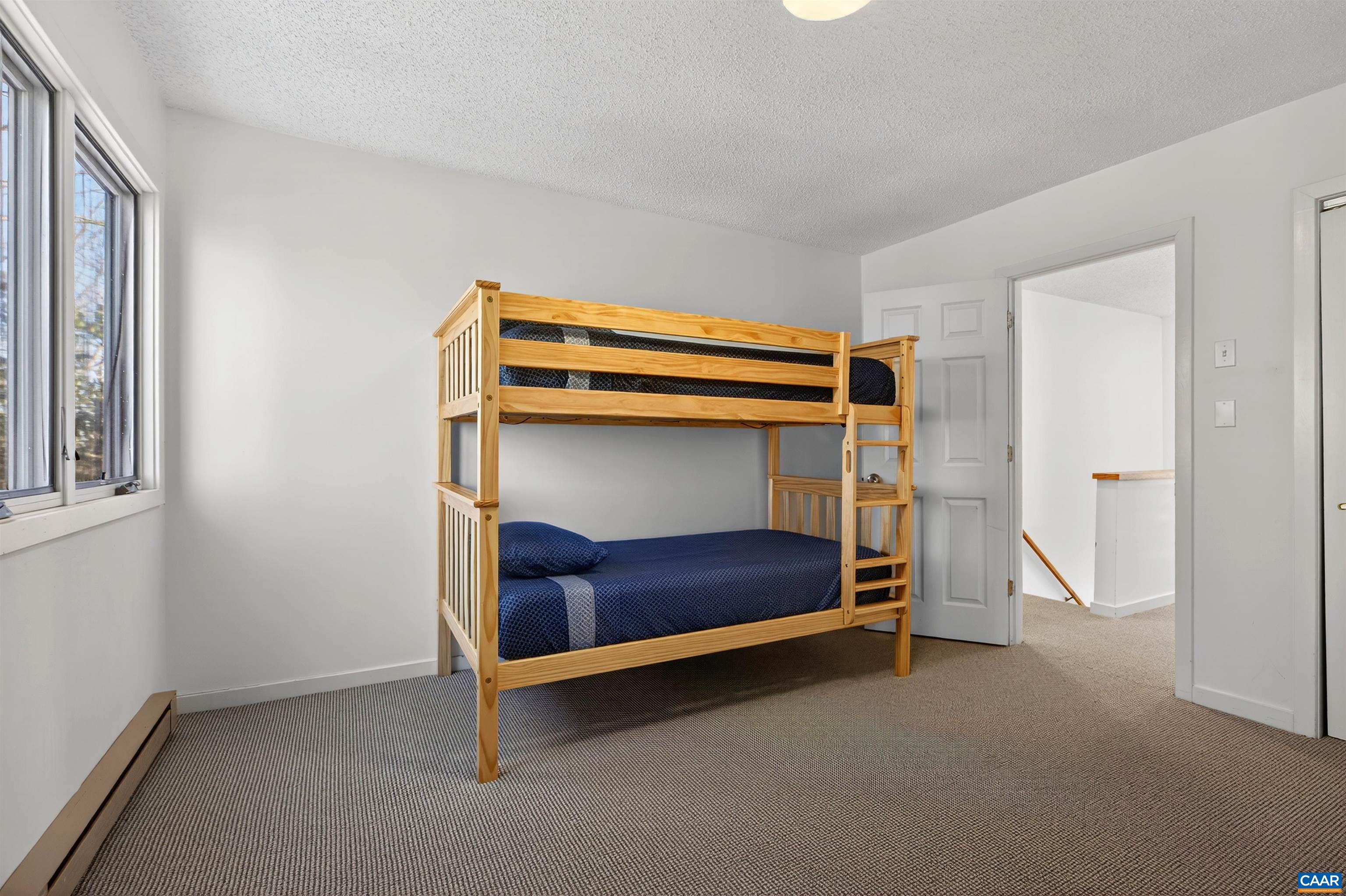 22 Trillium Cl Roseland, VA 22967 - Photo 34 of 35 a bedroom with a bed and a window