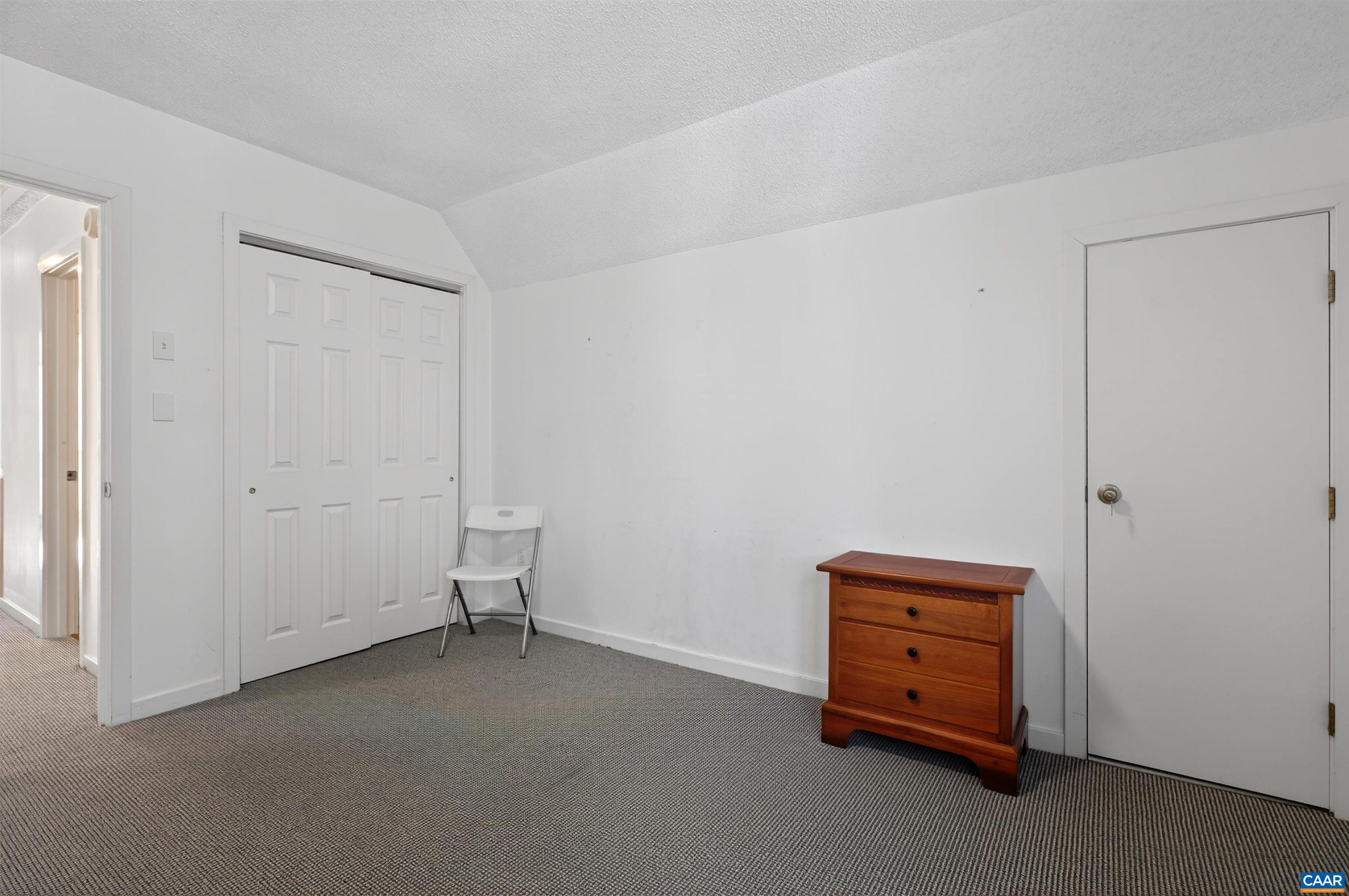 22 Trillium Cl Roseland, VA 22967 - Photo 35 of 35 a room with a cabinet and mirror
