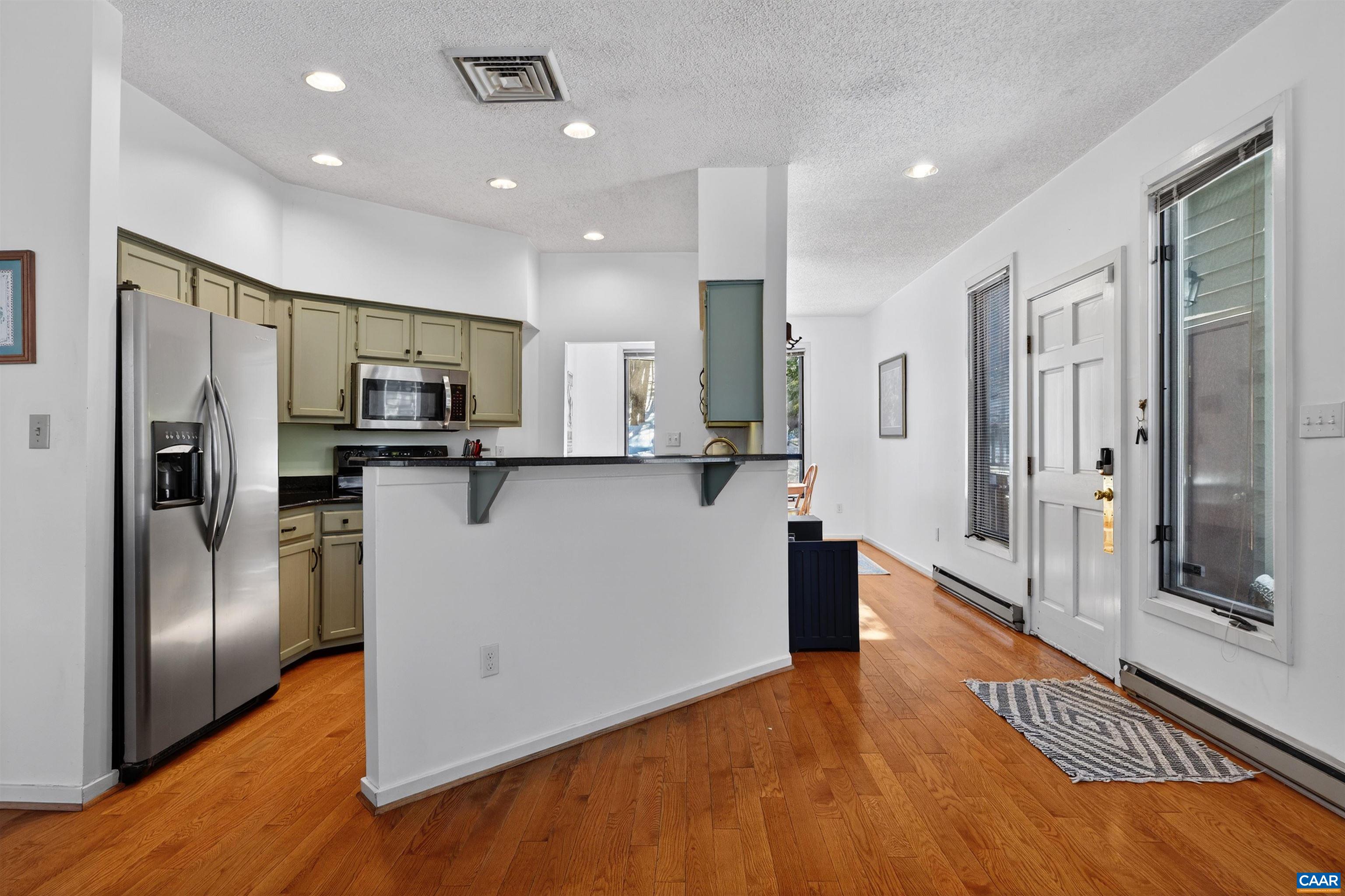 22 Trillium Cl Roseland, VA 22967 - Photo 9 of 35 a kitchen with stainless steel appliances a refrigerator and a stove top oven
