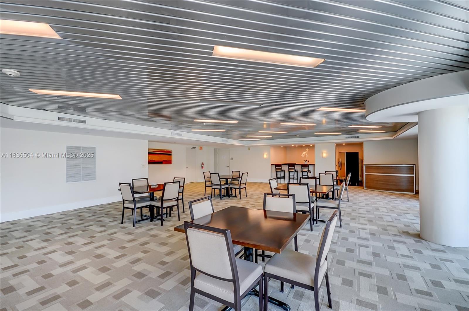 3131 Northeast 188th Street, Unit 1808 Aventura, FL 33180 - Photo 52 of 72 a outdoor space with lots of tables and chairs