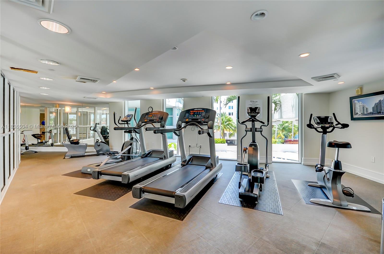 3131 Northeast 188th Street, Unit 1808 Aventura, FL 33180 - Photo 56 of 72 a view of a room with gym equipment