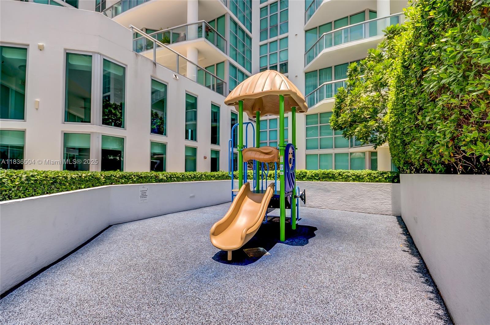 3131 Northeast 188th Street, Unit 1808 Aventura, FL 33180 - Photo 65 of 72 a view of a park with slide