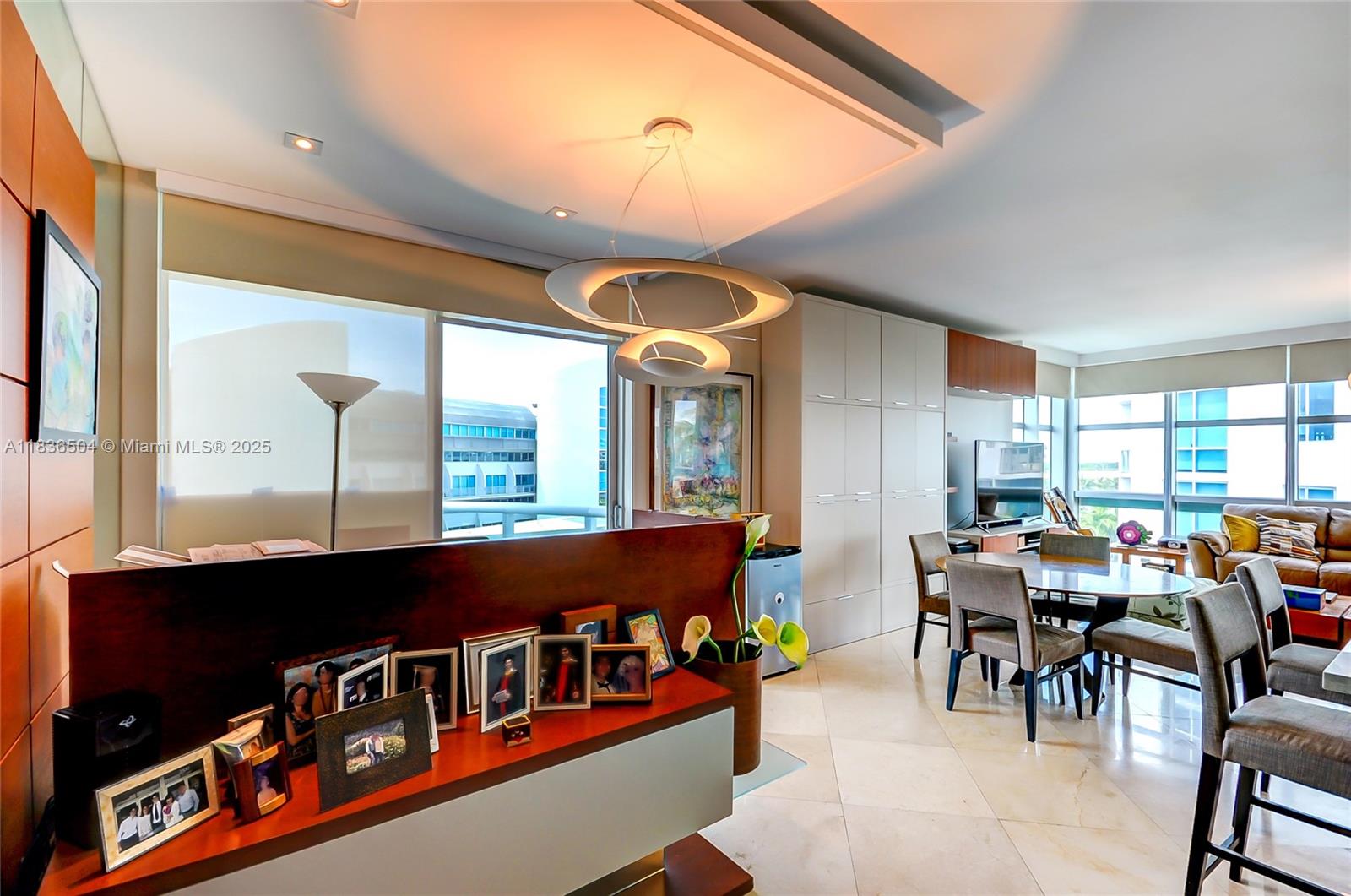 3131 Northeast 188th Street, Unit 1808 Aventura, FL 33180 - Photo 10 of 72 a view of a dining room with furniture window and outside view
