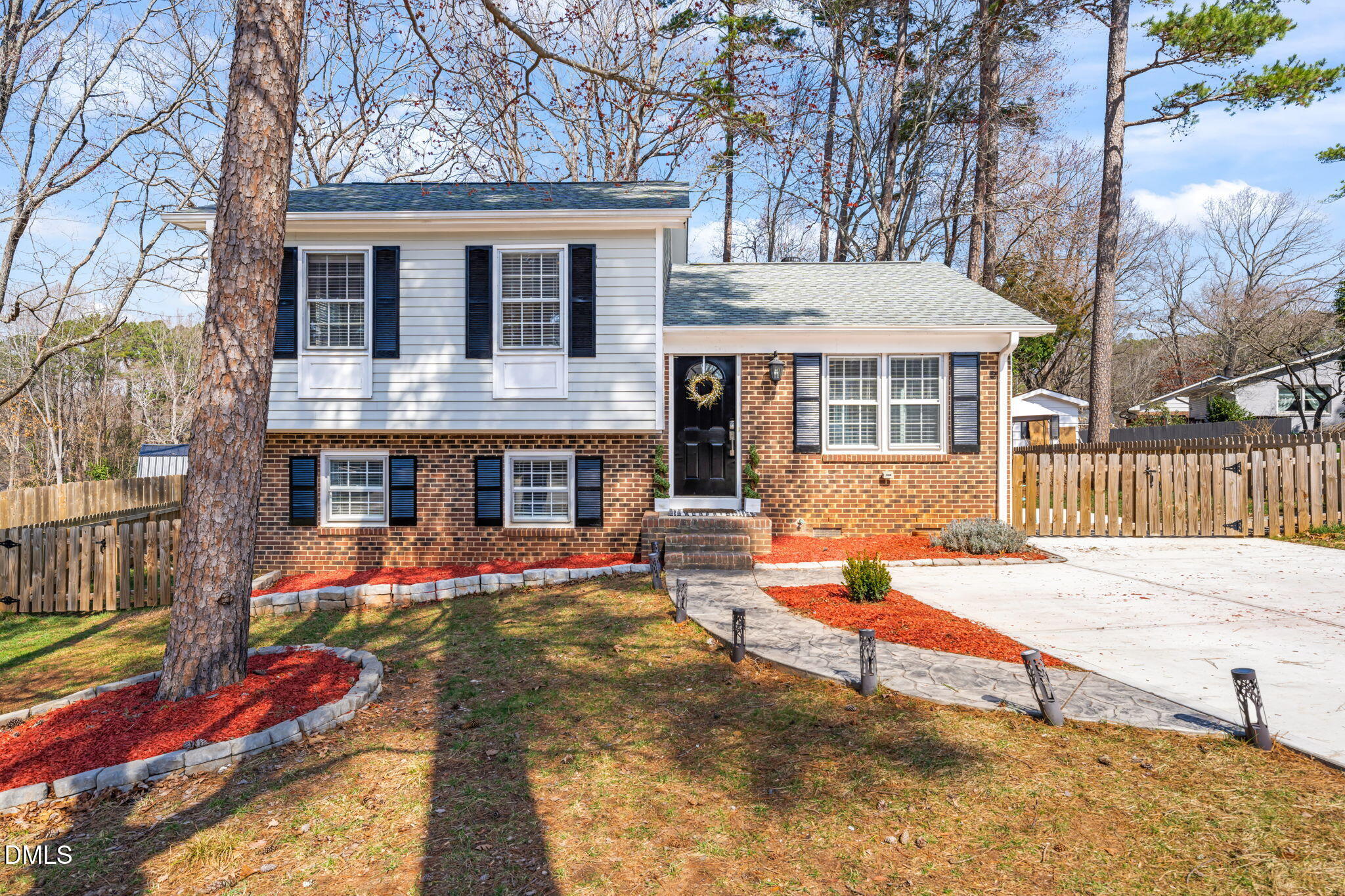 a backyard of a house with seating space