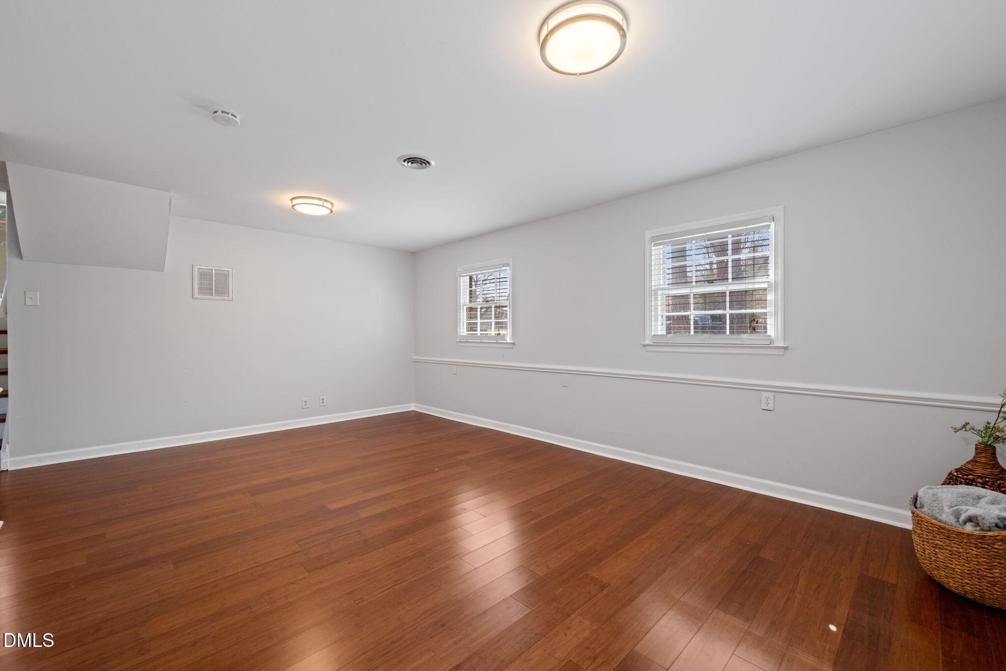 1004 Woodhill Court Raleigh, NC 27615 - Photo 27 of 43 a view of a livingroom with wooden floor