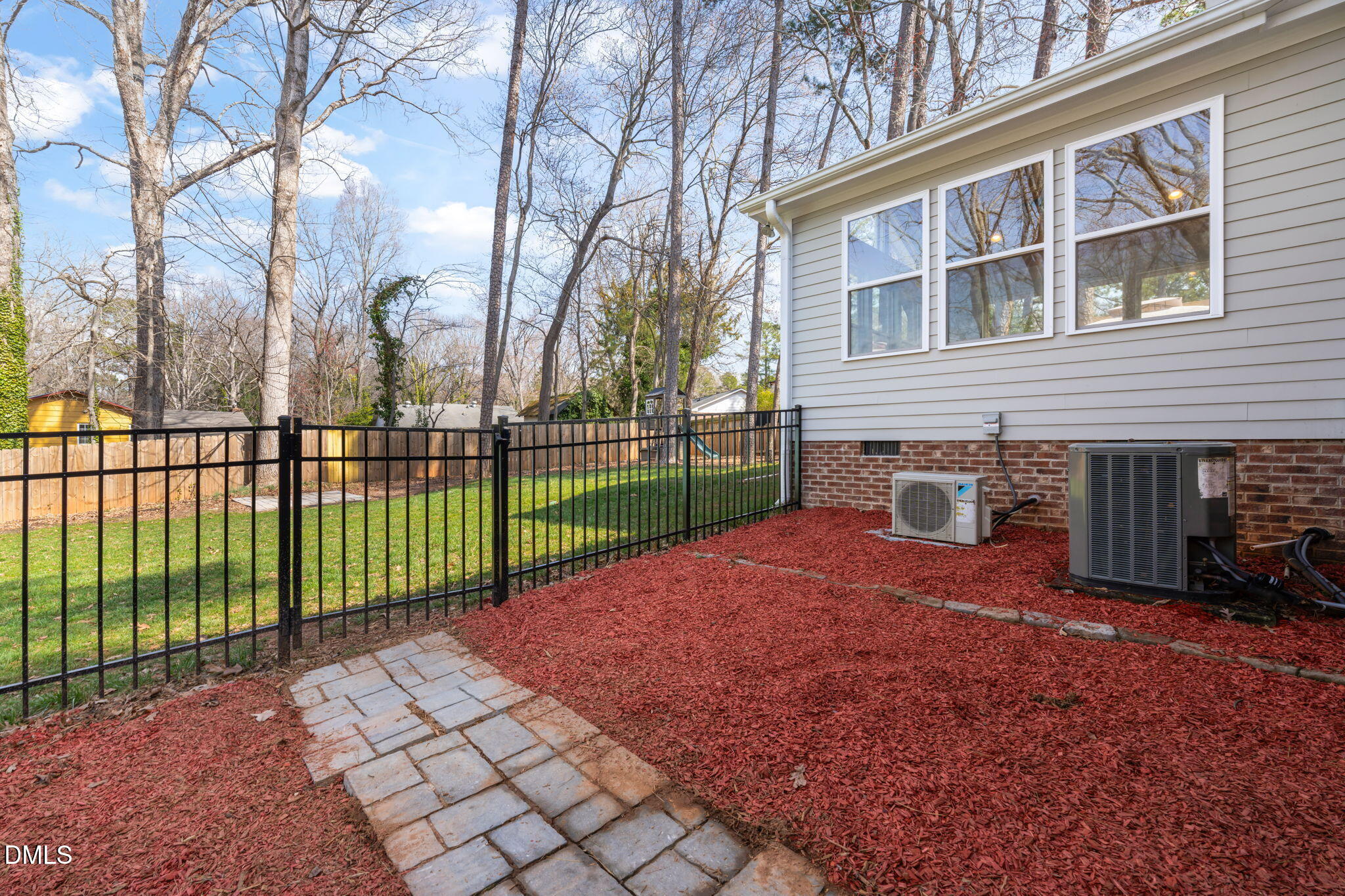 1004 Woodhill Court Raleigh, NC 27615 - Photo 31 of 43 a view of a backyard with a garden