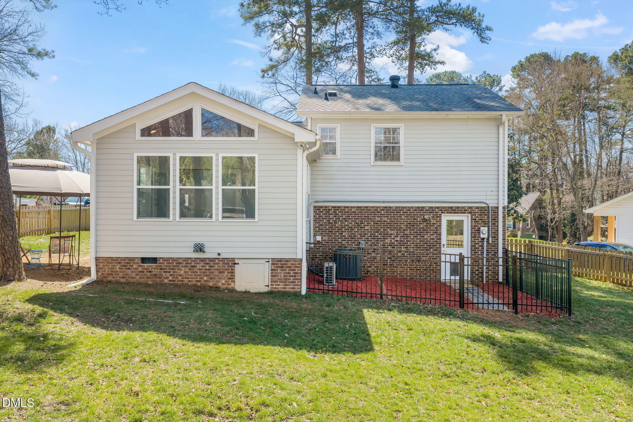 1004 Woodhill Court Raleigh, NC 27615 - Photo 39 of 43 a front view of a house with a yard