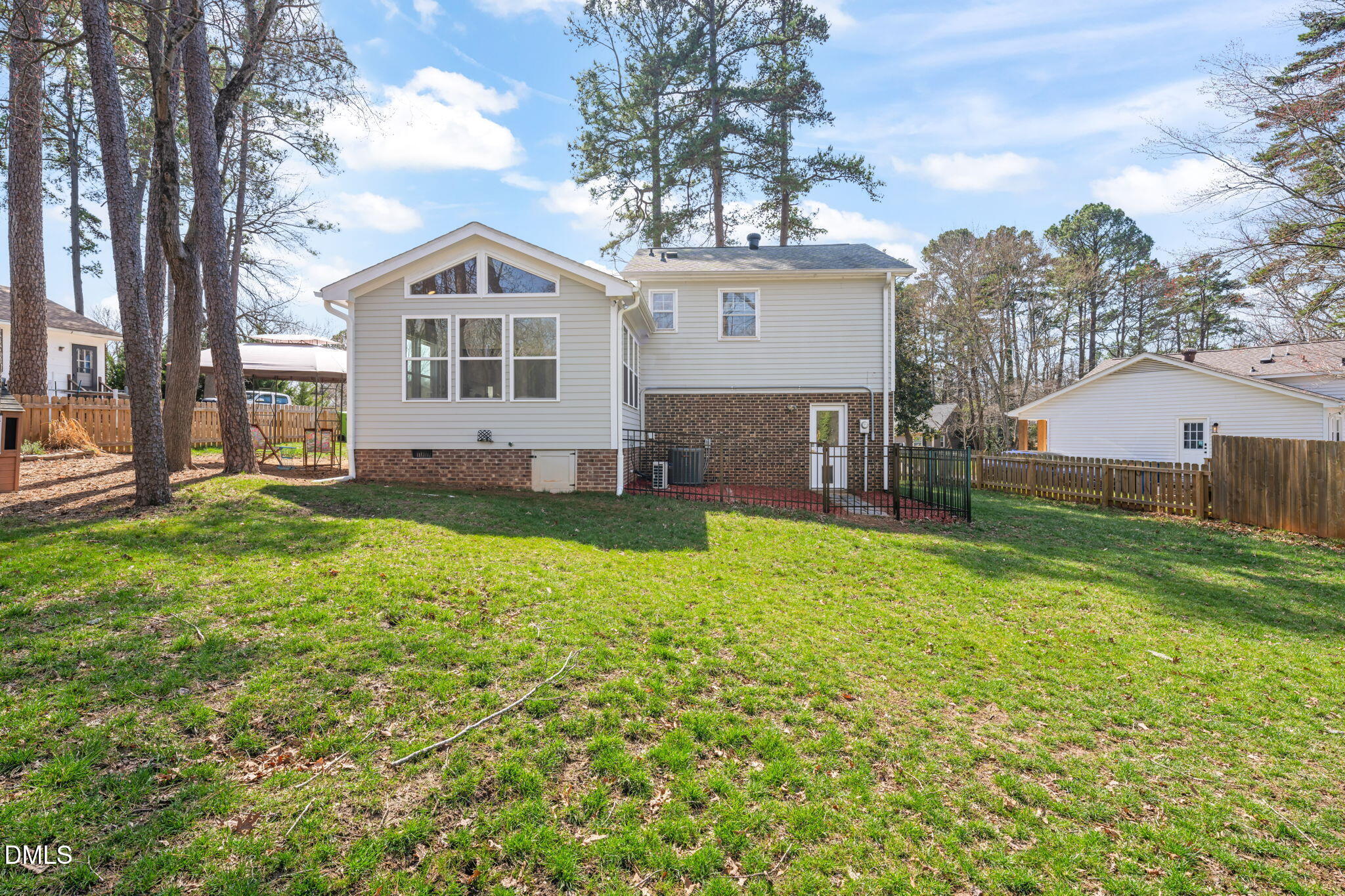1004 Woodhill Court Raleigh, NC 27615 - Photo 40 of 43 a front view of house with yard and green space