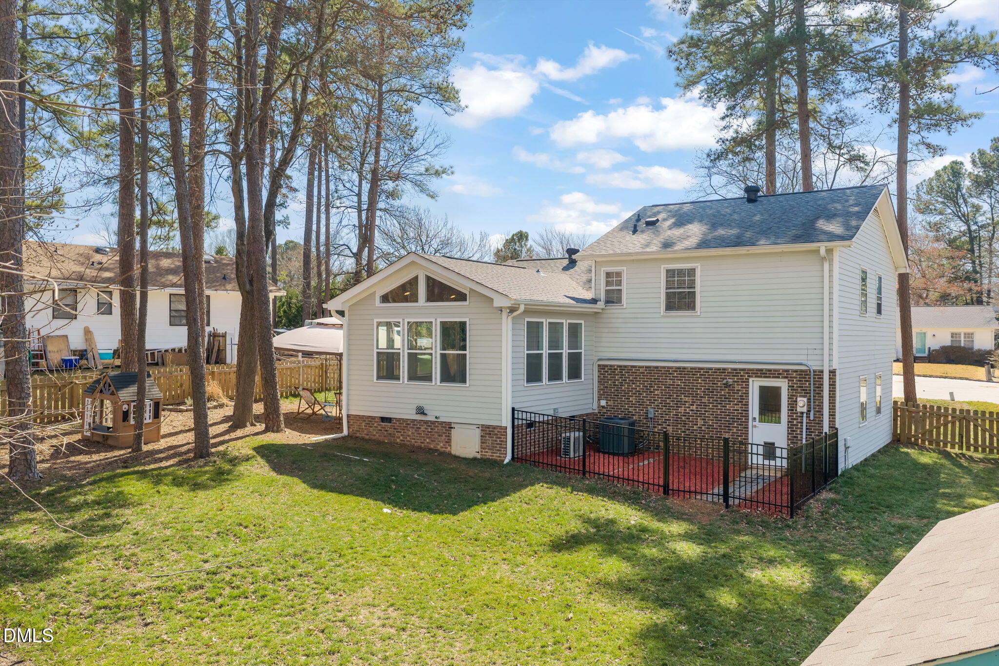 1004 Woodhill Court Raleigh, NC 27615 - Photo 41 of 43 a view of house with yard and sitting area