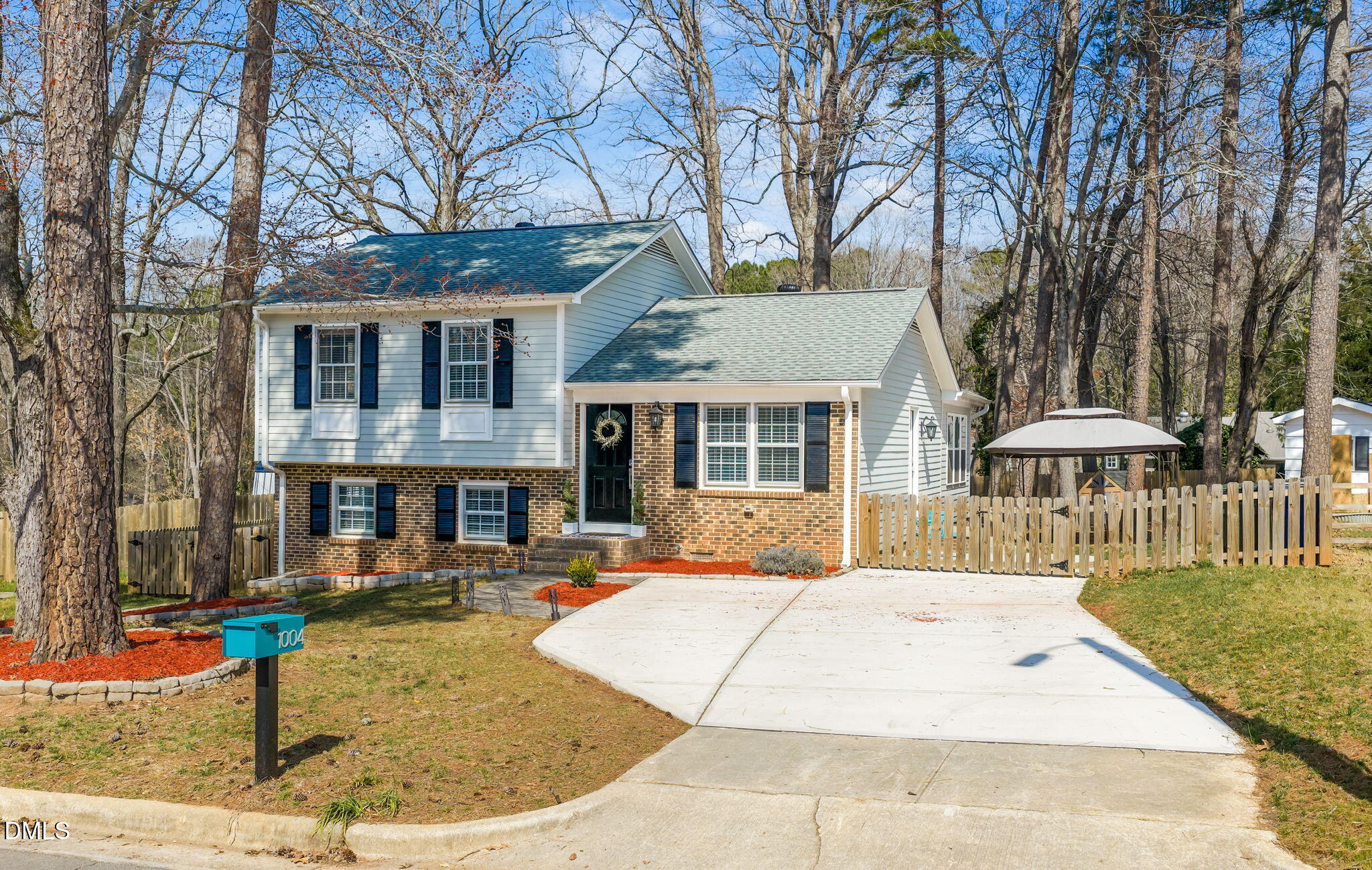 1004 Woodhill Court Raleigh, NC 27615 - Photo 42 of 43 a front view of a house with entertaining space