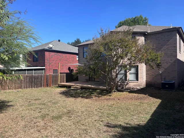 a view of a house with a snow in the yard