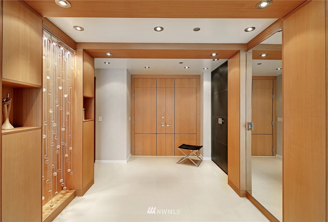177 107th Avenue Northeast, Unit 1202 Bellevue, WA 98004 - Photo 2 of 25 a view of a hallway with a bathroom