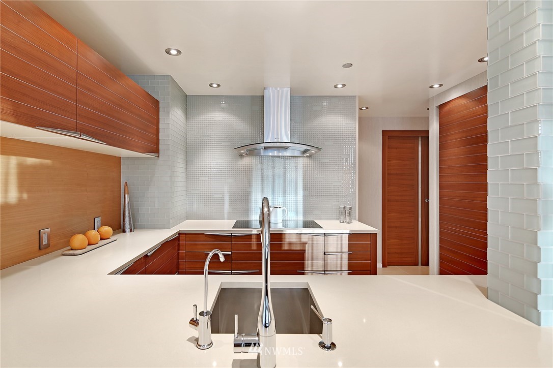 177 107th Avenue Northeast, Unit 1202 Bellevue, WA 98004 - Photo 12 of 25 a room with a bed and a table