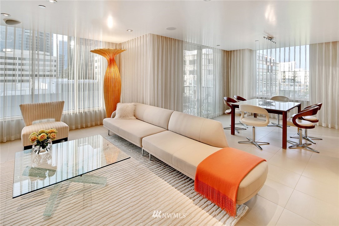 177 107th Avenue Northeast, Unit 1202 Bellevue, WA 98004 - Photo 5 of 25 a living room with furniture and a window
