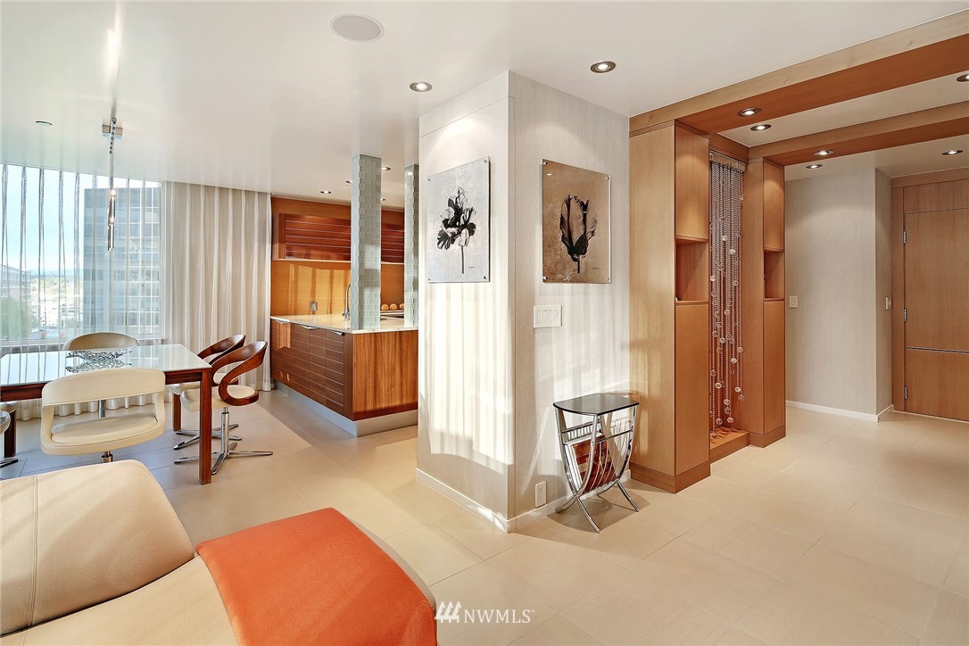 177 107th Avenue Northeast, Unit 1202 Bellevue, WA 98004 - Photo 7 of 25 a living room with furniture and a area