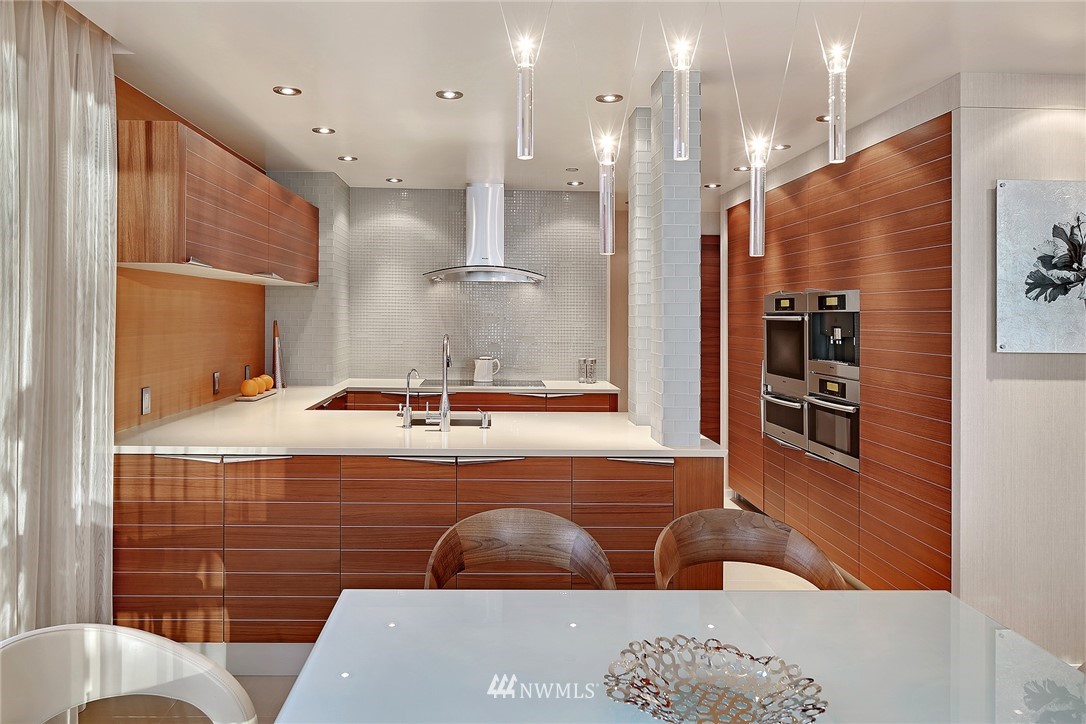 177 107th Avenue Northeast, Unit 1202 Bellevue, WA 98004 - Photo 9 of 25 a view of bathroom with a tub sink and mirror