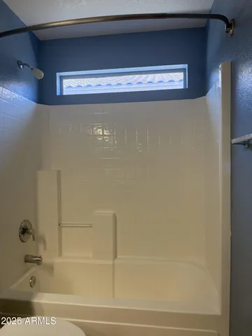 a bathroom with a bathtub