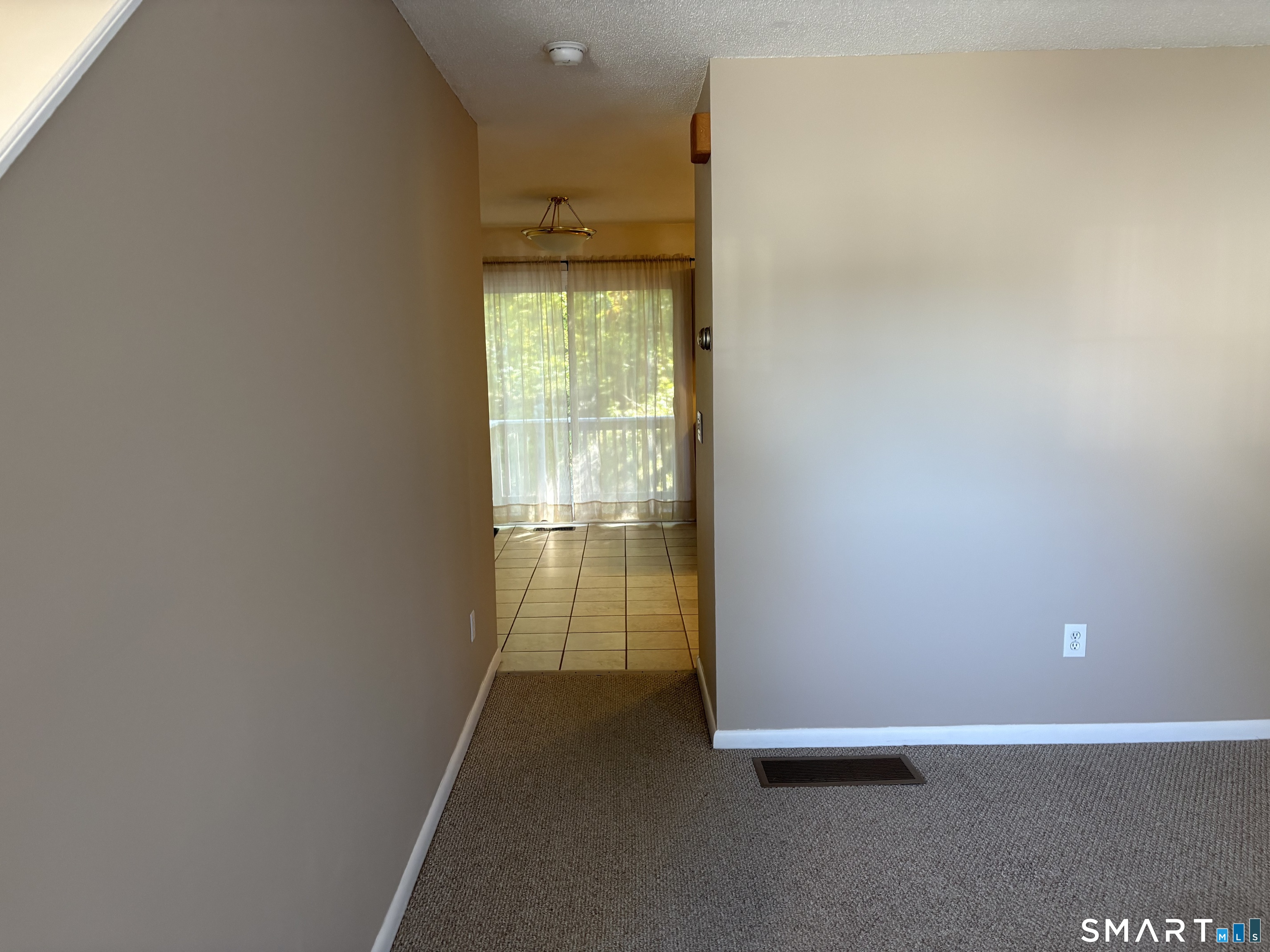 229 Branford Road, Unit 528 North Branford, CT 06471 - Photo 11 of 30 Living Room With View To Kitchen