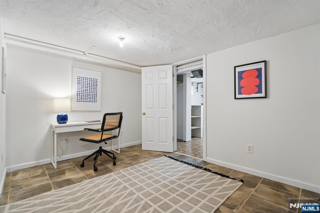 26 Rutgers Place Bloomfield, NJ 07003 - Photo 27 of 38 a workspace with wooden floor