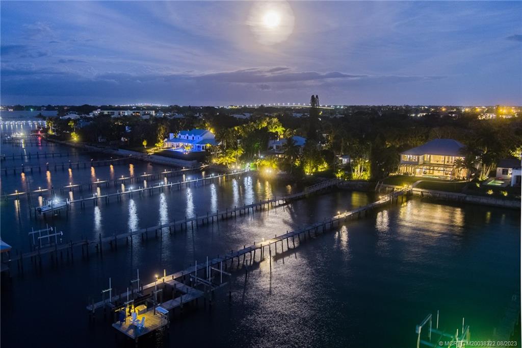 1455 Southeast Riverside Drive Stuart, FL 34996 - Photo 98 of 100 As the moon rises over Stuart, the twinkling lights of the homes and docks along the river say Goodnight, Moon