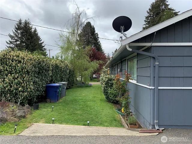 a backyard of a house with lots of green space