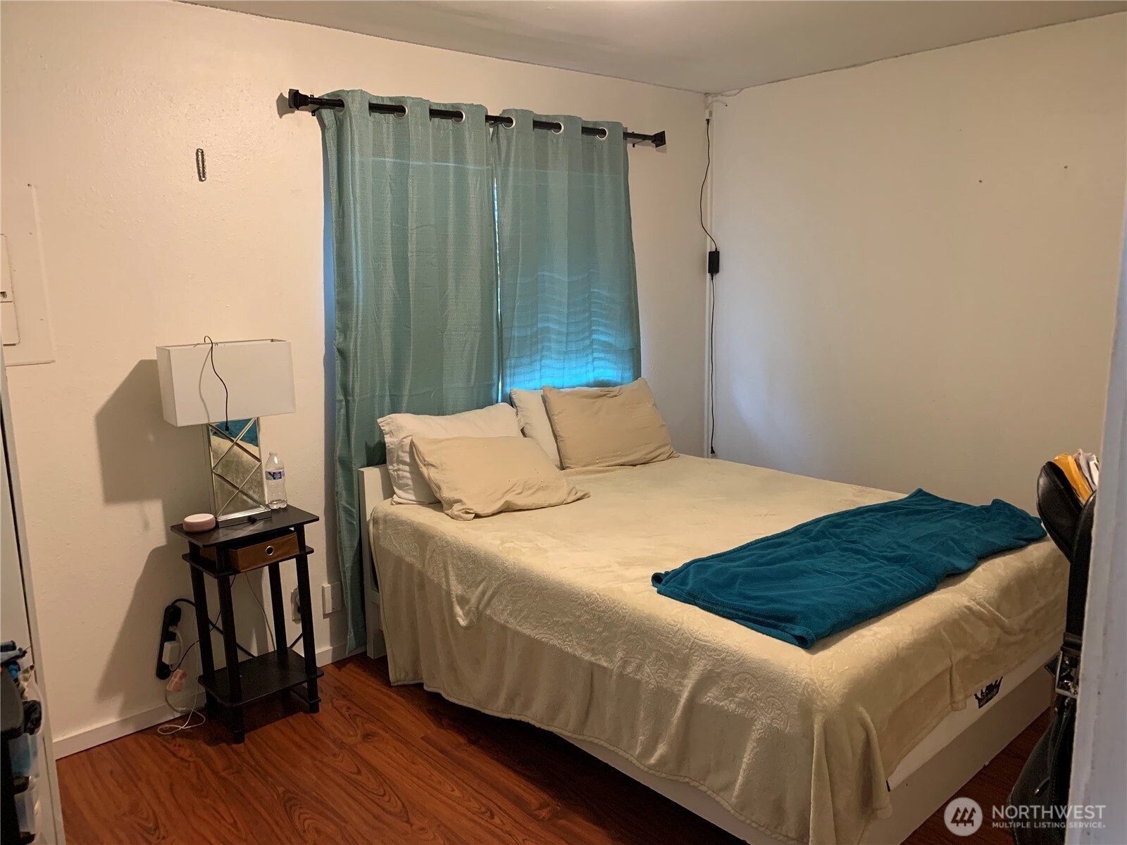 1429 Kirkland Avenue Northeast Renton, WA 98056 - Photo 10 of 19 a bedroom with a bed and a mirror