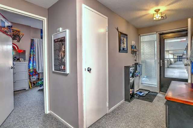 a view of a livingroom with furniture and a livingroom