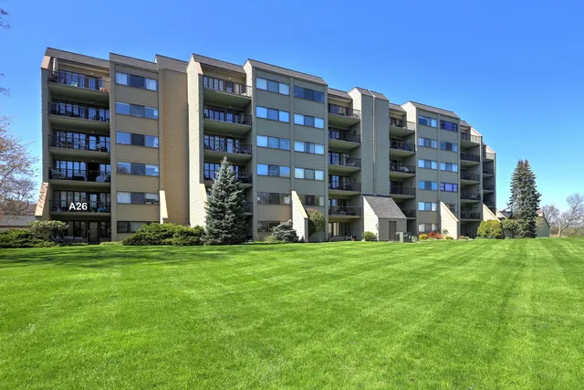 a view of building with yard
