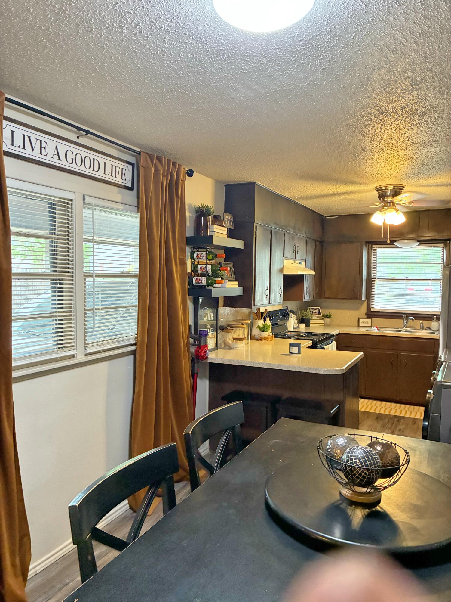 4203 17th Street Lubbock, TX 79416 - Photo 5 of 15 a room with furniture and a window