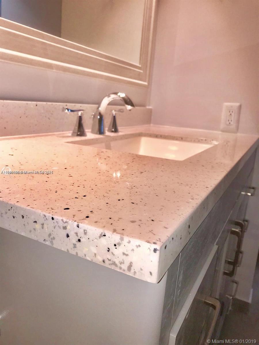 2228 Southwest 80th Terrace, Unit 2228 Miramar, FL 33025 - Photo 14 of 18 a bathroom with a bathtub