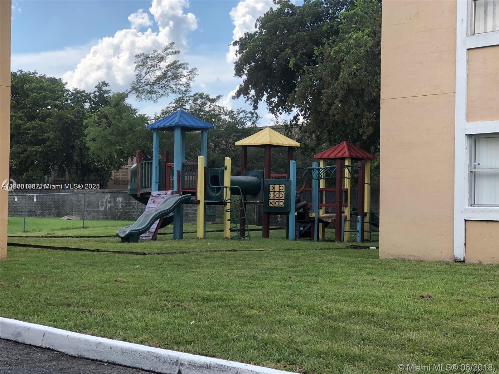 2228 Southwest 80th Terrace, Unit 2228 Miramar, FL 33025 - Photo 18 of 18 a view of a house with a backyard porch and sitting area