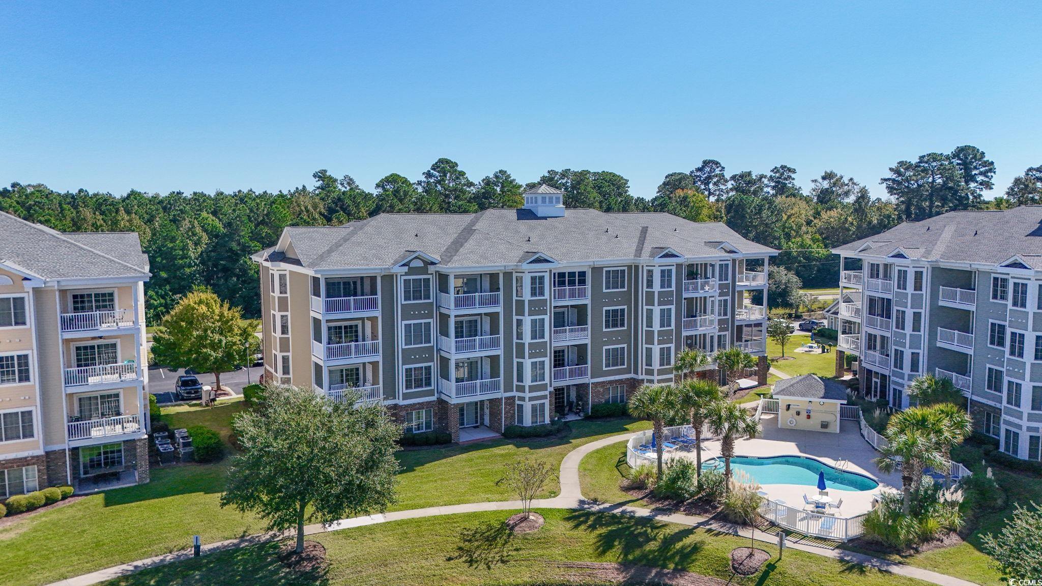 4821 Luster Leaf Circle, Unit 105 Myrtle Beach, SC 29577 - Photo 27 of 40 View of apartment building / complex