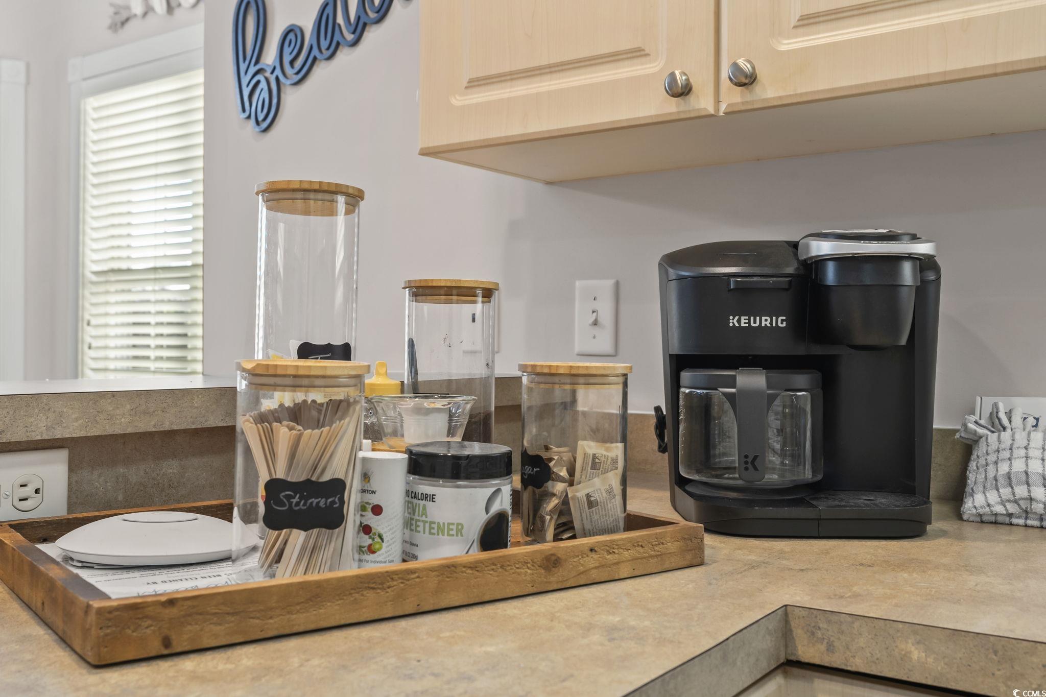 4821 Luster Leaf Circle, Unit 105 Myrtle Beach, SC 29577 - Photo 6 of 40 Kitchen view of light brown cabinetry