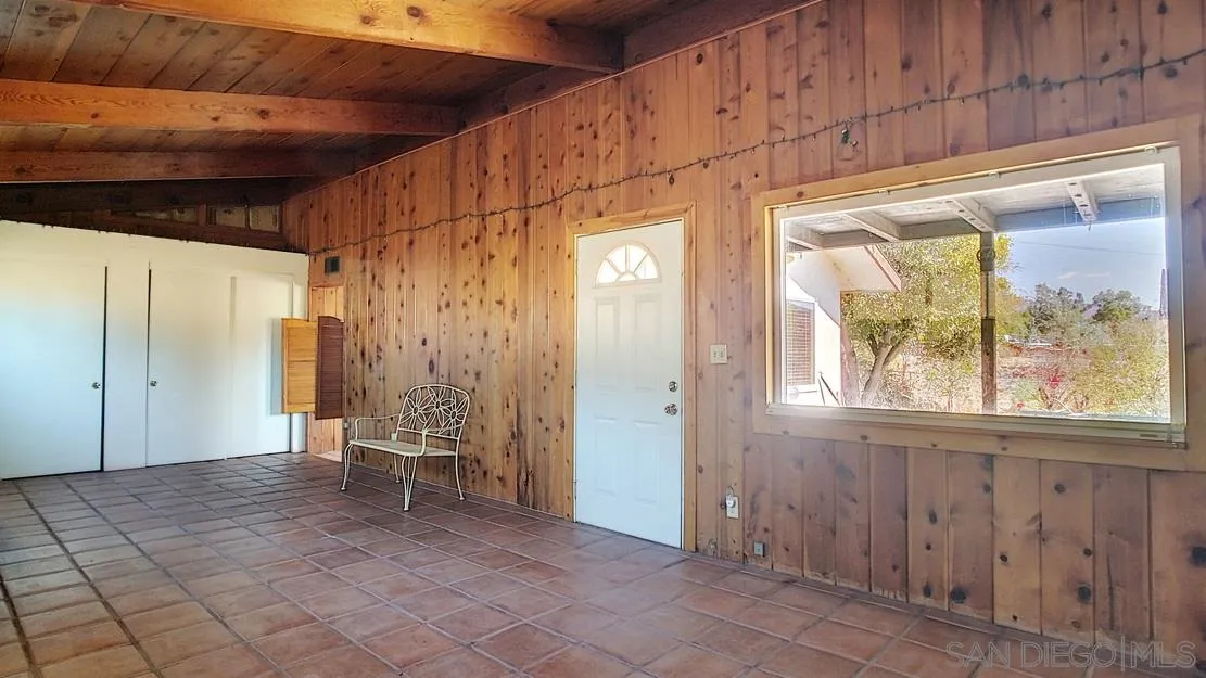 3966 Willows Road Alpine, CA 91901 - Photo 9 of 14 a view of an empty room with a window