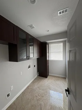 a view of an empty room with window