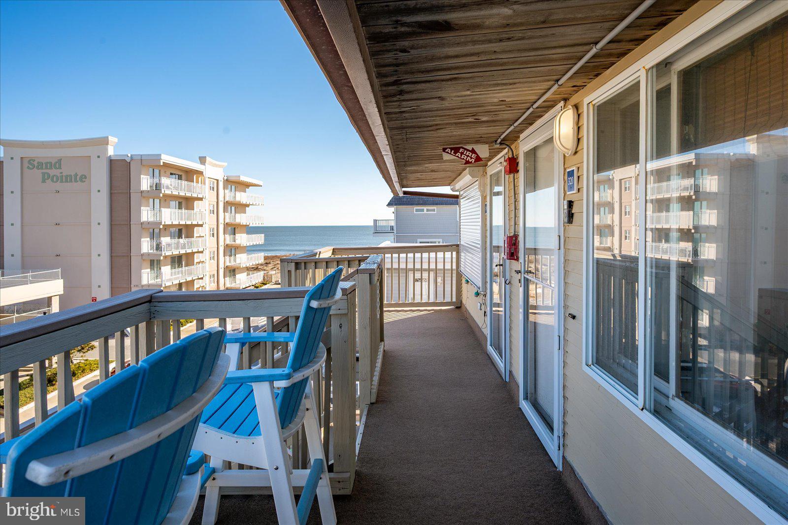 9 41st Street, Unit 320 Ocean City, MD 21842 - Photo 29 of 36 a view of a balcony with chairs