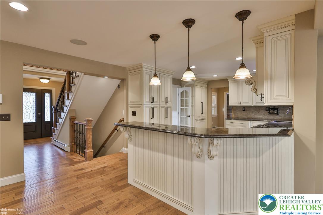 284 Walker Road Macungie, PA 18062 - Photo 38 of 99 a view of a kitchen with kitchen island stainless steel appliances and wooden floor